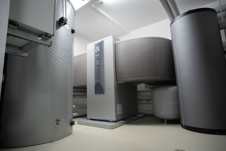 Heat pump installation on the side of a house